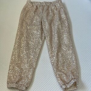 Serra sparkly pants, beige-rose gold type color. Size medium.